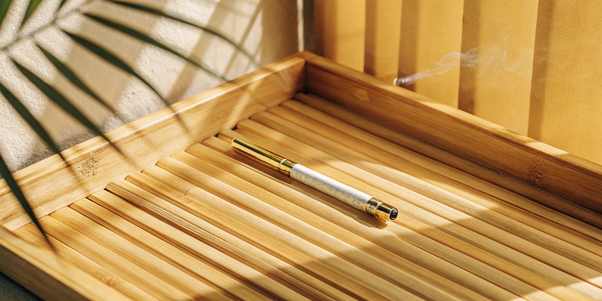The best THC vape pen for ultimate relaxation resting on a wooden tray.