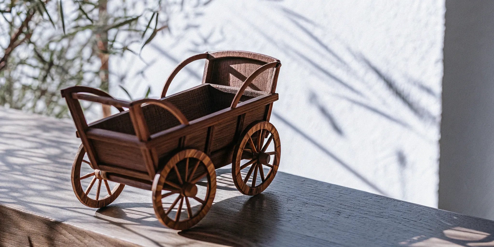 A wooden cart in sunlight from a guide to the best live resin cart brands.
